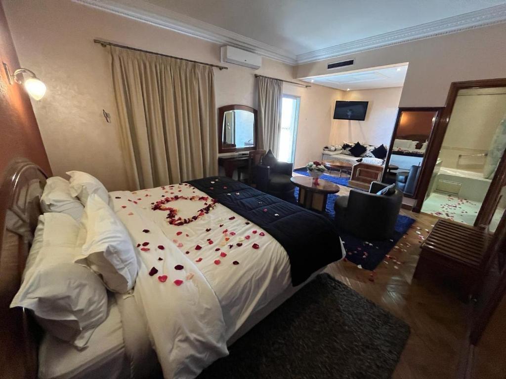 Postel nebo postele na pokoji v ubytování Hotel Malta