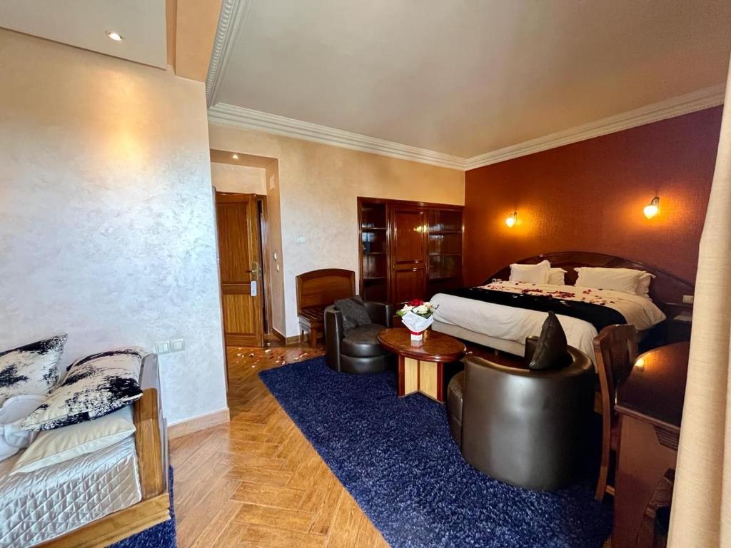 Postel nebo postele na pokoji v ubytování Hotel Malta