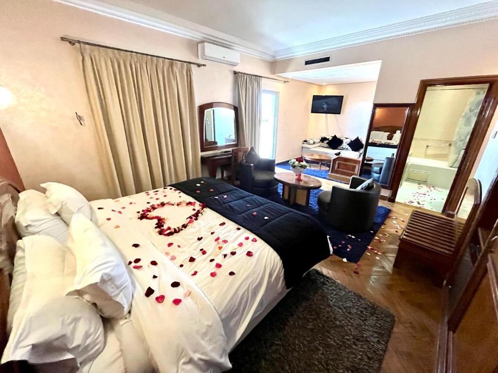 Postel nebo postele na pokoji v ubytování Hotel Malta