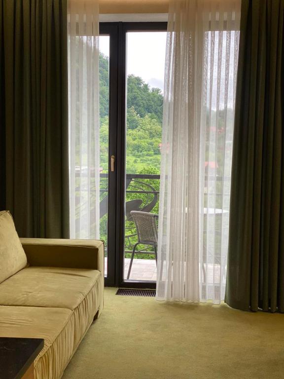 Posezení v ubytování Molfar Resort Hotel & SPA Карпати
