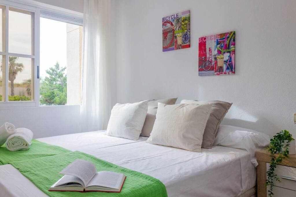 Posteľ alebo postele v izbe v ubytovaní Apartamento Pink Summer