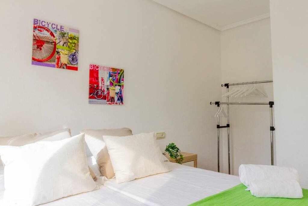Posteľ alebo postele v izbe v ubytovaní Apartamento Pink Summer