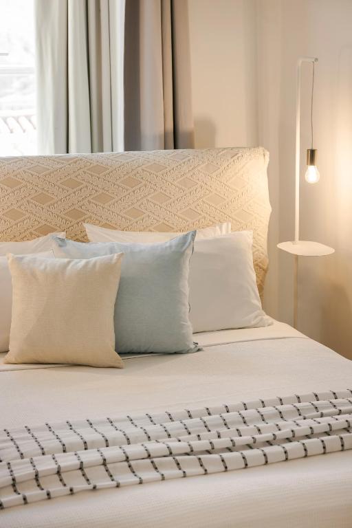 Postel nebo postele na pokoji v ubytování Hydra Hotel