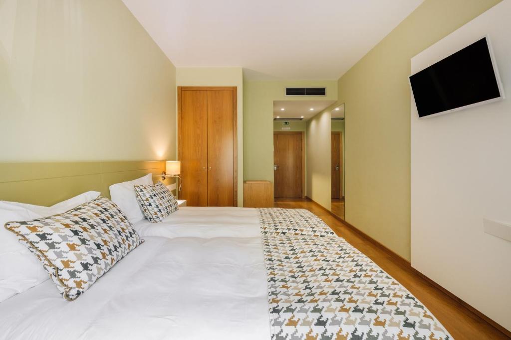 Postel nebo postele na pokoji v ubytování Alva Valley Hotel