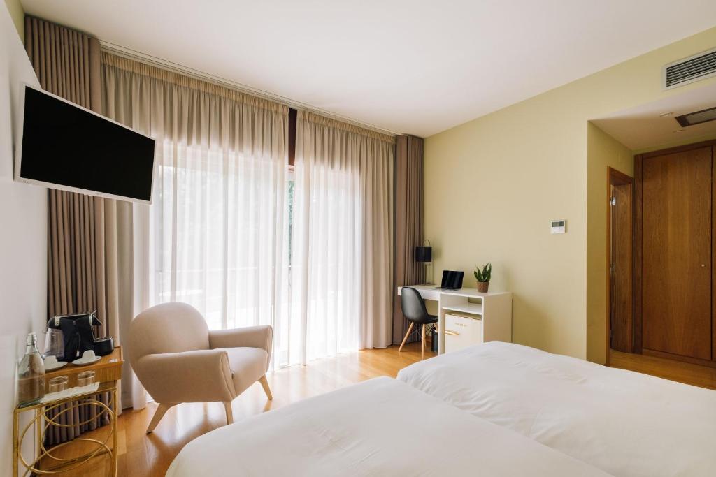 TV a/nebo společenská místnost v ubytování Alva Valley Hotel