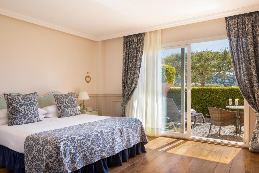 Hotel BlauMar Llafrancにあるベッド