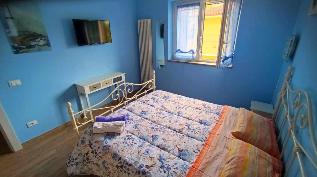 Un pat sau paturi într-o cameră la Domus Bolsena