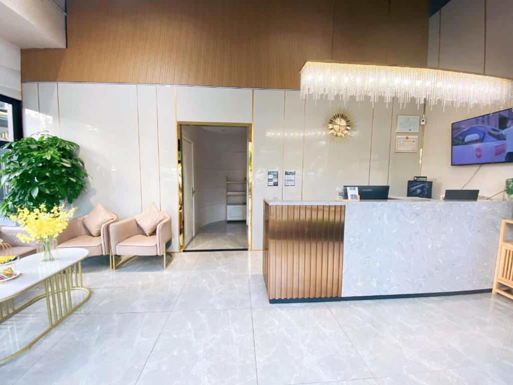 TV a/nebo společenská místnost v ubytování Serveyou International Apartment - Free Airport Pickup & Free Canton Fair Shuttle Bus