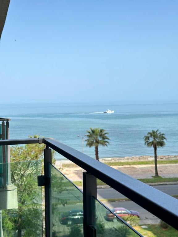a balcony with a view of the ocean at Aqua Batumi 46 in Batumi