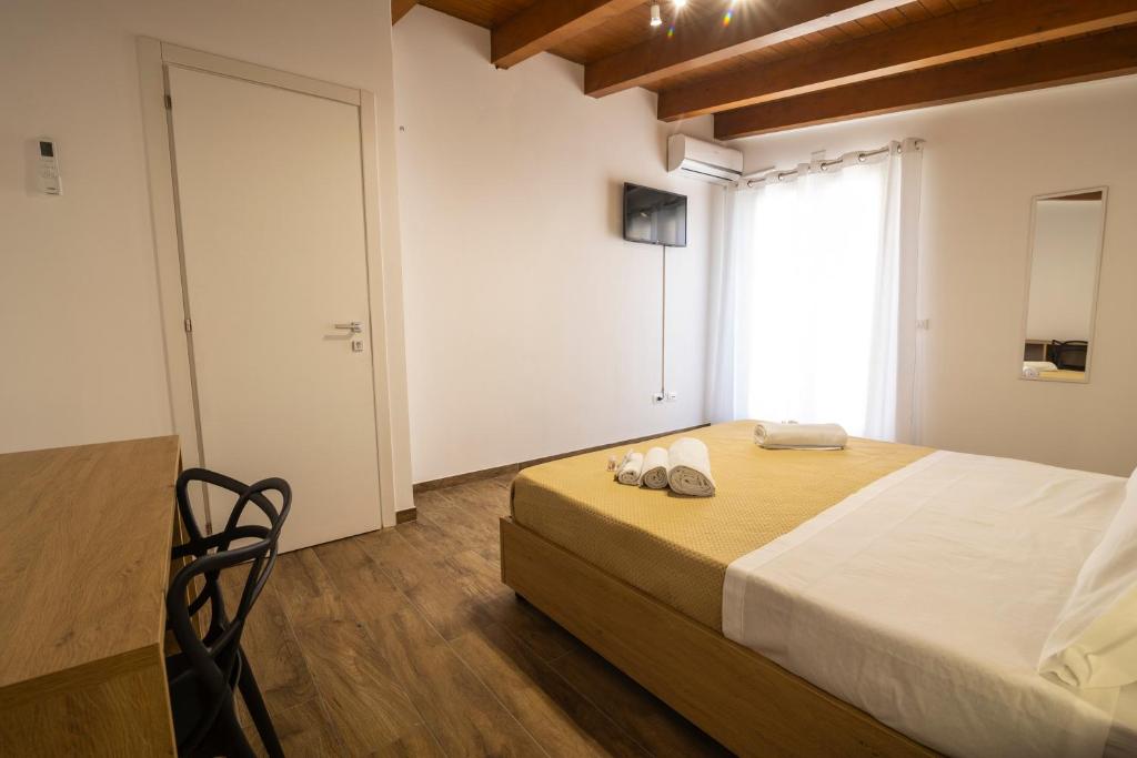 Postel nebo postele na pokoji v ubytování Quattro Canti