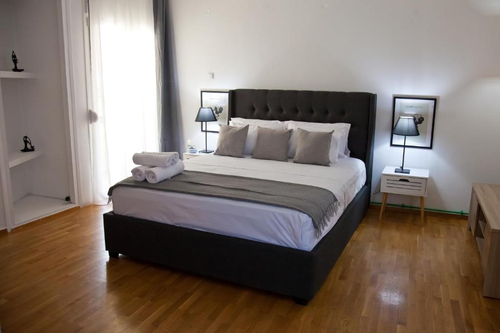 Ένα ή περισσότερα κρεβάτια σε δωμάτιο στο Casa Reale Ioannina