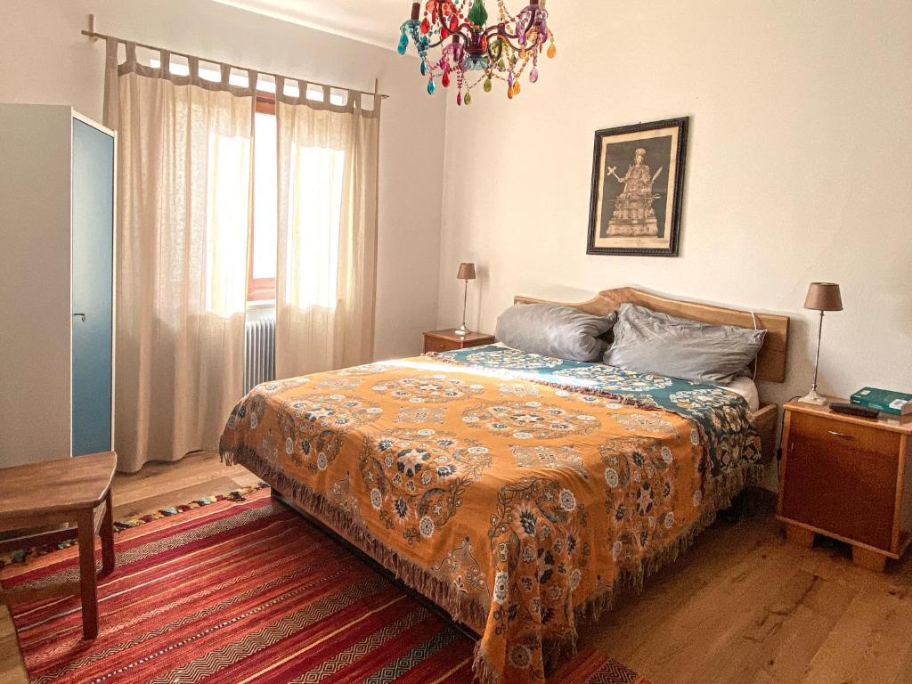 Postel nebo postele na pokoji v ubytování Villa Rosa Friuli