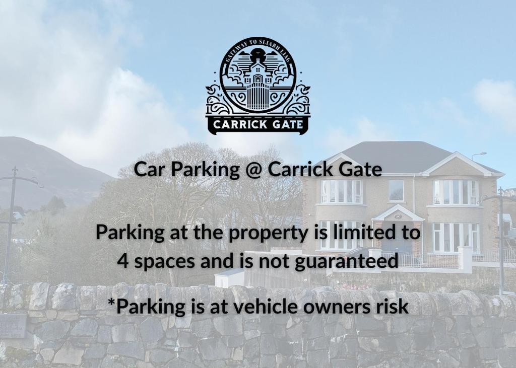 a picture of a car parking sign in front of a house at Carrick Gate in Carrick