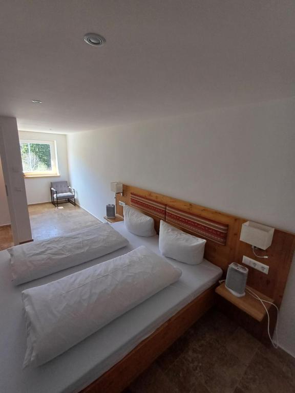 Postel nebo postele na pokoji v ubytování Hotel Großbach