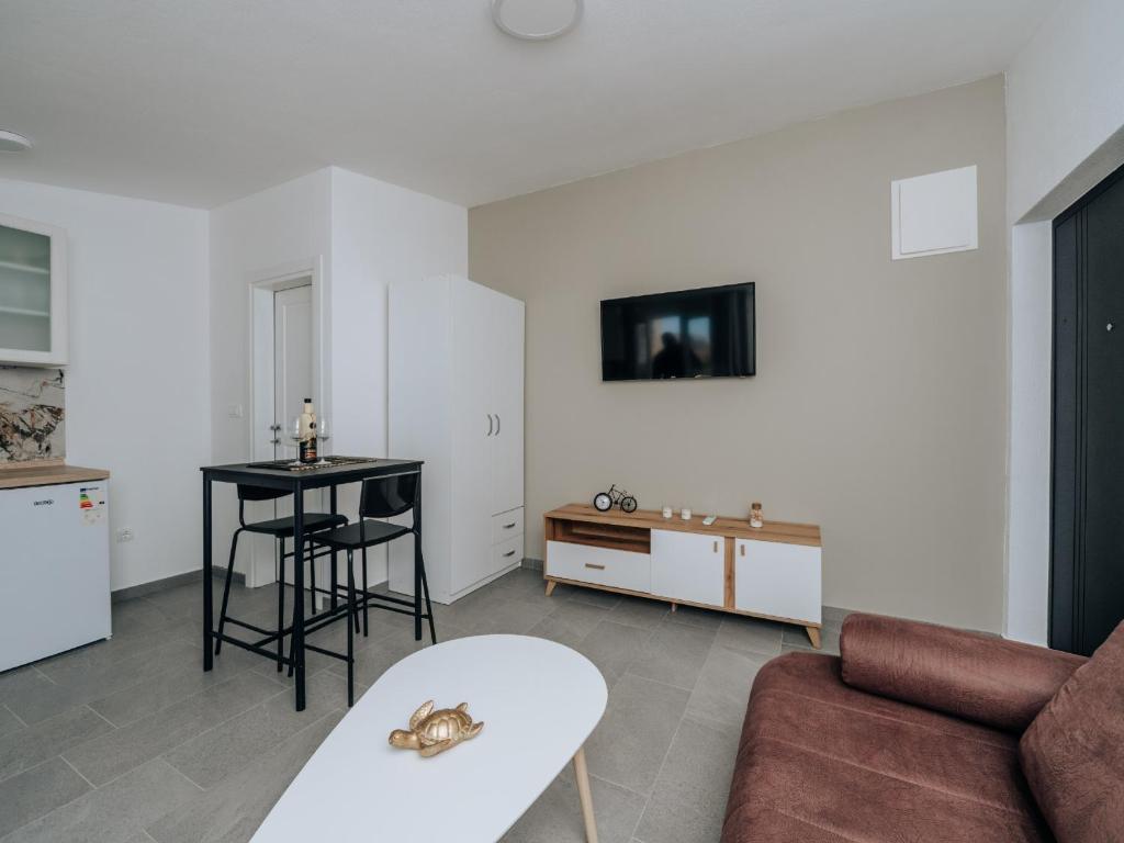 Kuchyň nebo kuchyňský kout v ubytování Apartments Milivojevic