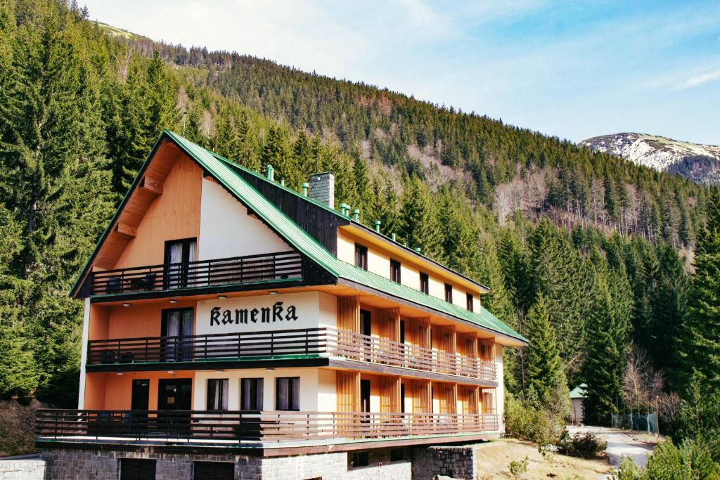 a large building with the name tamarica on it at Hotel Esprit in Špindlerův Mlýn