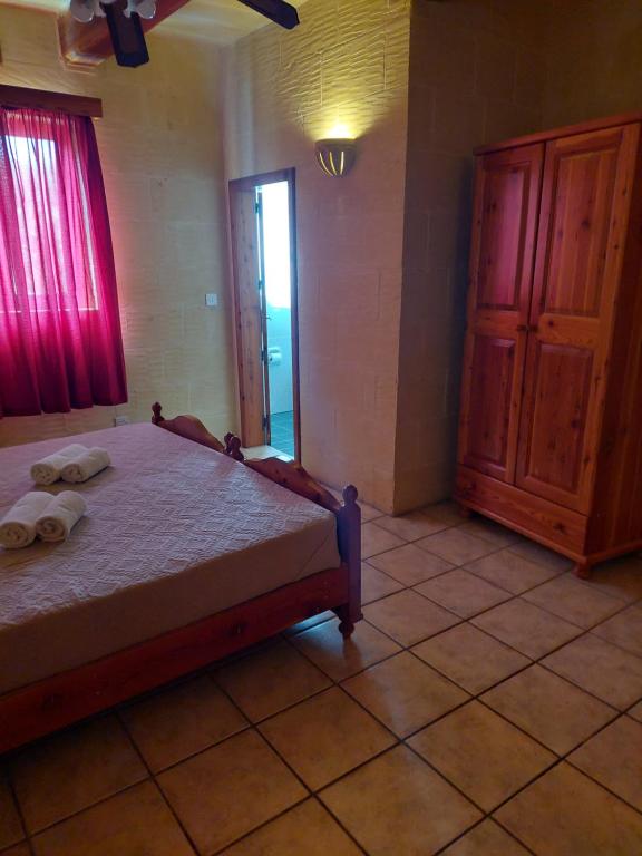 Postel nebo postele na pokoji v ubytování MJ Farmhouse B&B