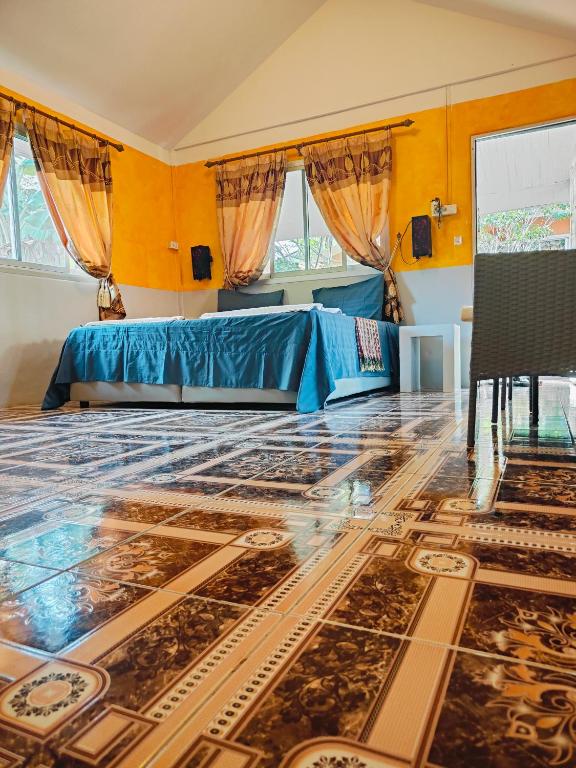 Postel nebo postele na pokoji v ubytování Ban Elephant Blanc Bungalow