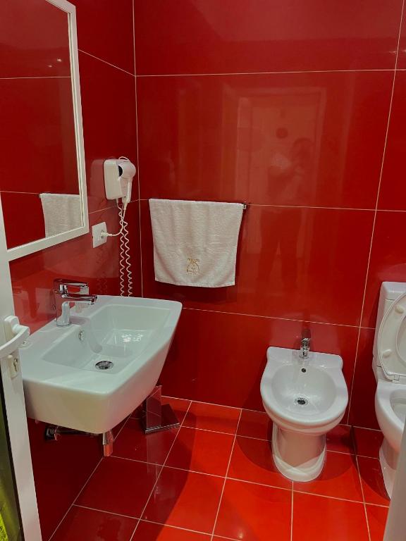 Koupelna v ubytování Imperium Hotel