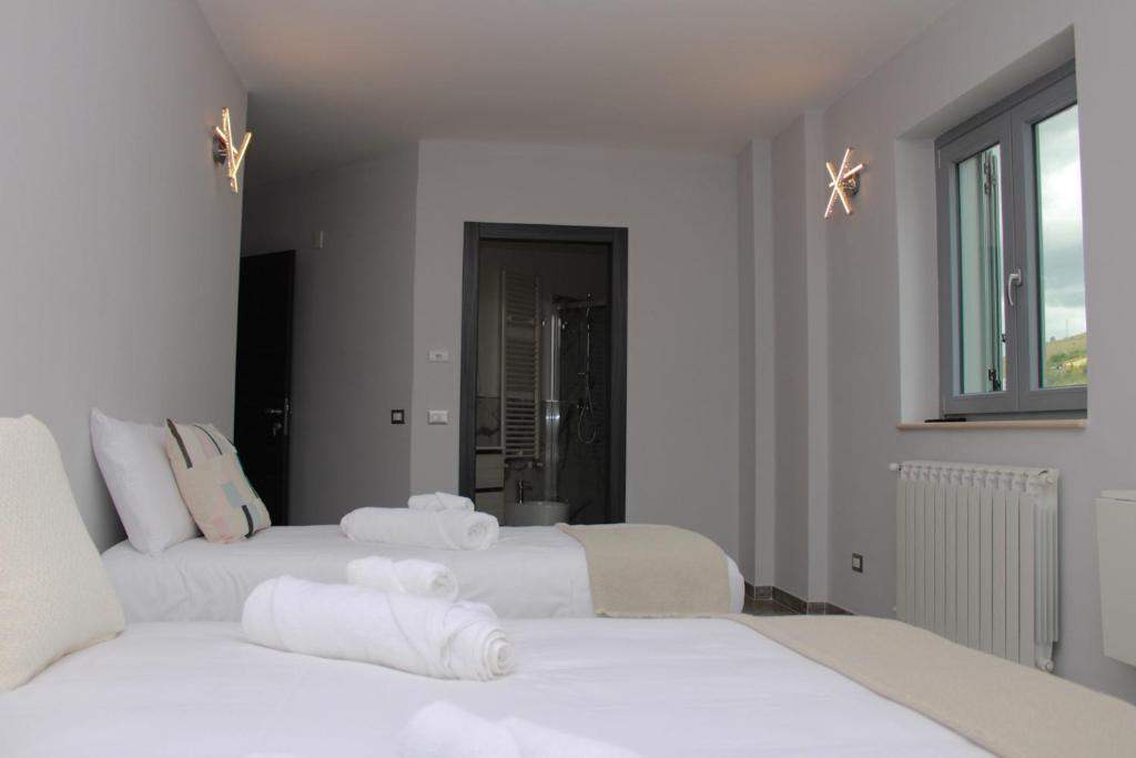 Postel nebo postele na pokoji v ubytování JOHN'S ROOMS