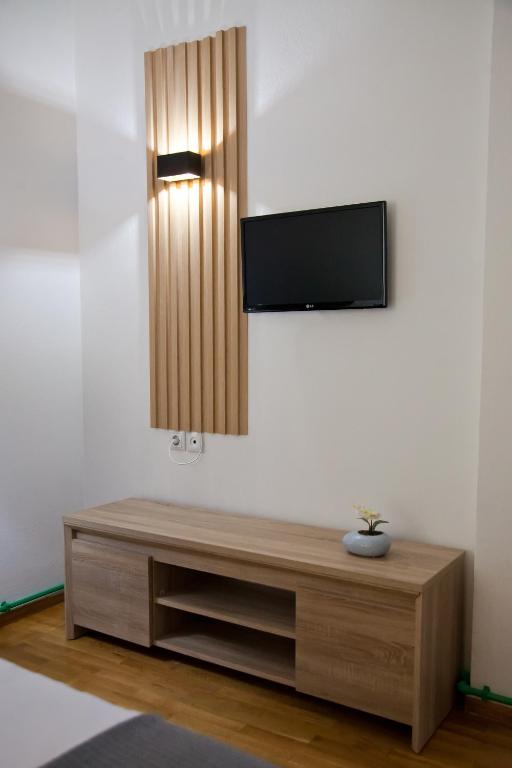 TV a/nebo společenská místnost v ubytování Casa Reale Ioannina
