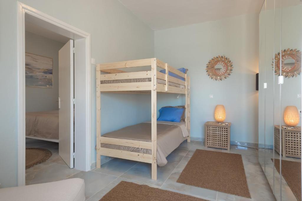 A bed or beds in a room at Nikos Studios