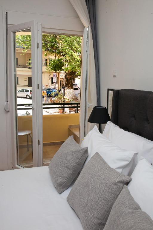 Postel nebo postele na pokoji v ubytování Casa Reale Ioannina