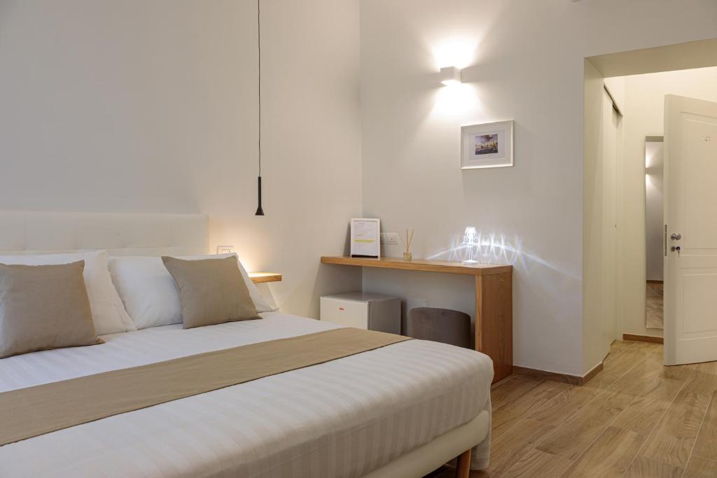 Postel nebo postele na pokoji v ubytování Blanco B&B - Group