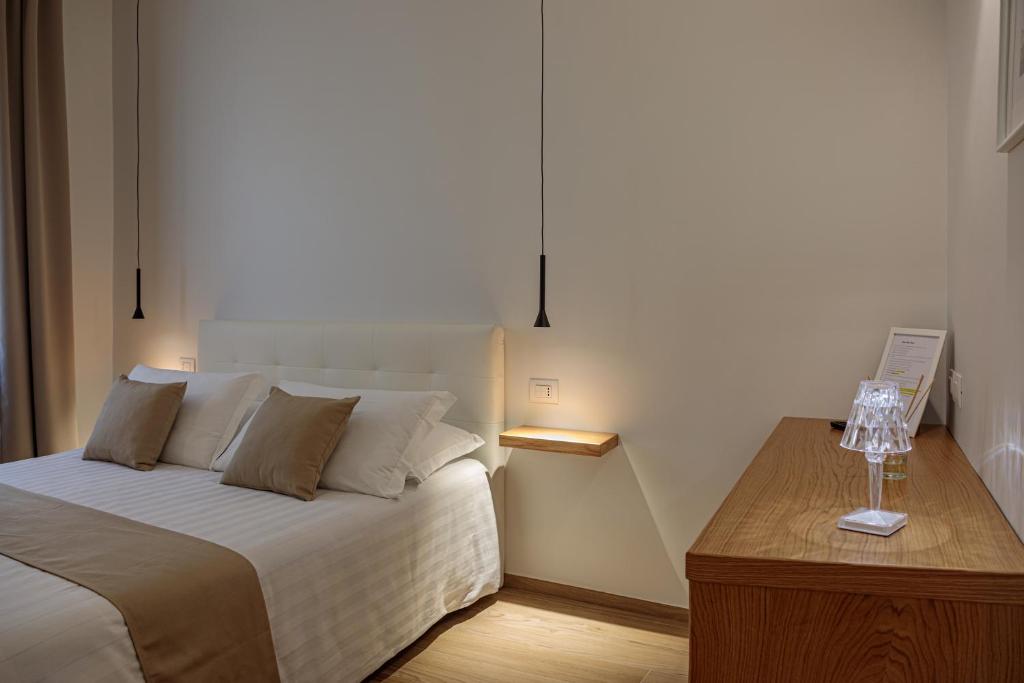 Postel nebo postele na pokoji v ubytování Blanco B&B - Group