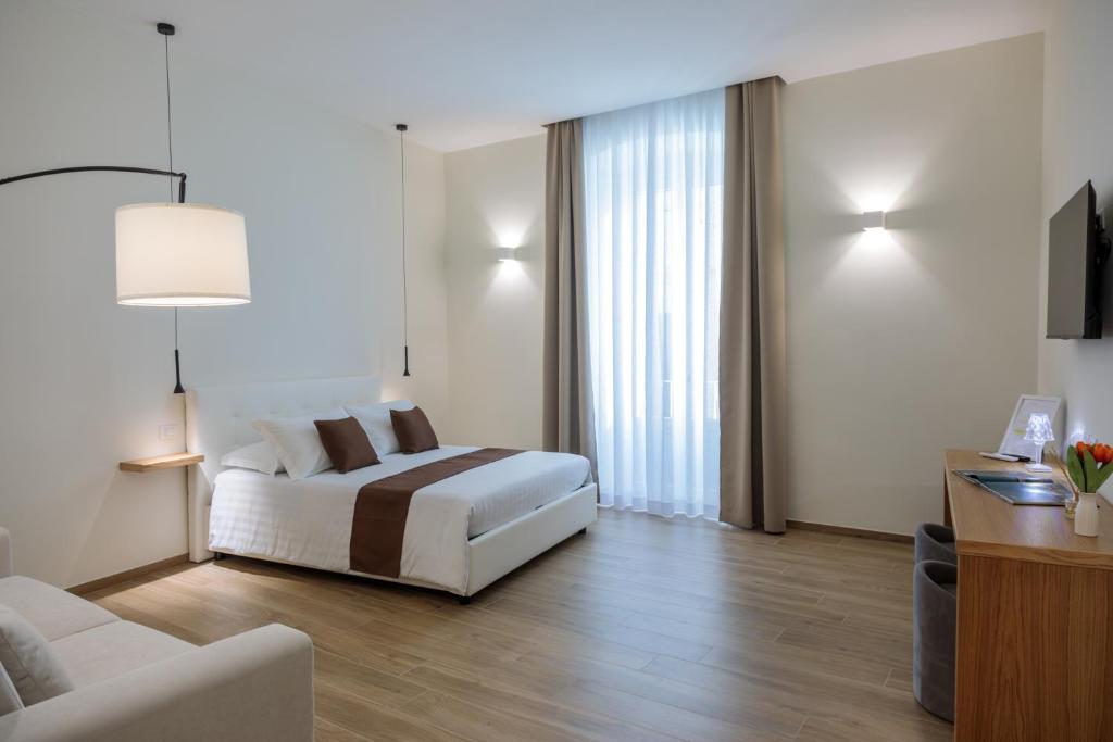 Postel nebo postele na pokoji v ubytování Blanco B&B - Group