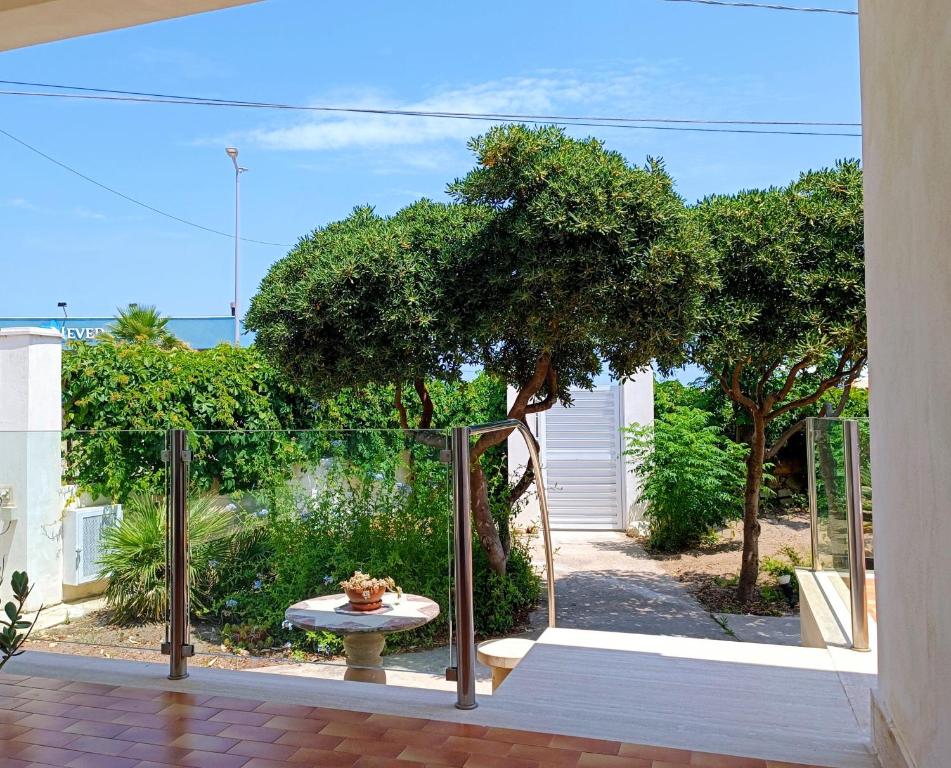 A garden outside Villa On The Beach Spiaggia Plaia