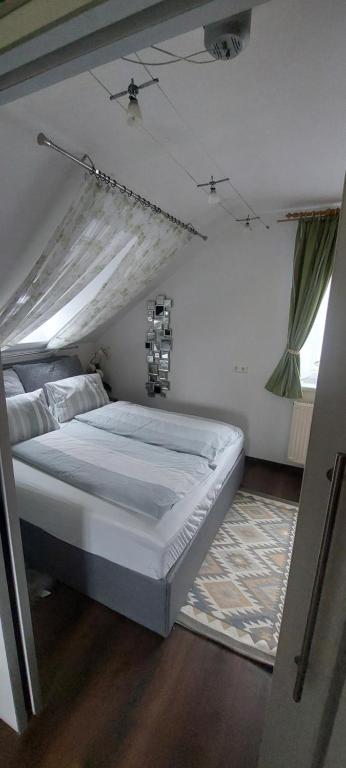 Postel nebo postele na pokoji v ubytování Ferienhaus Erika