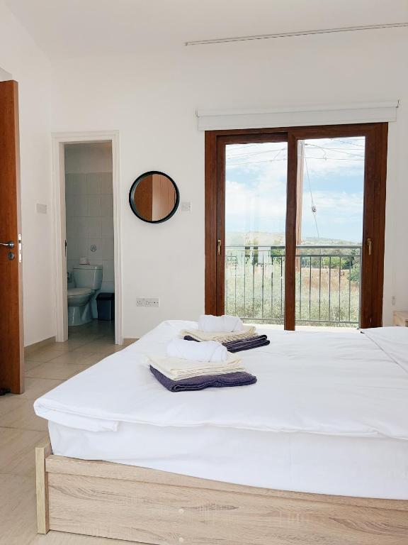Postel nebo postele na pokoji v ubytování White Mountain Pool Villas