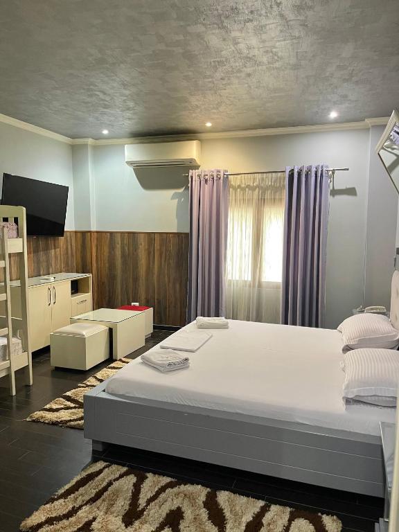 Postel nebo postele na pokoji v ubytování Imperium Hotel