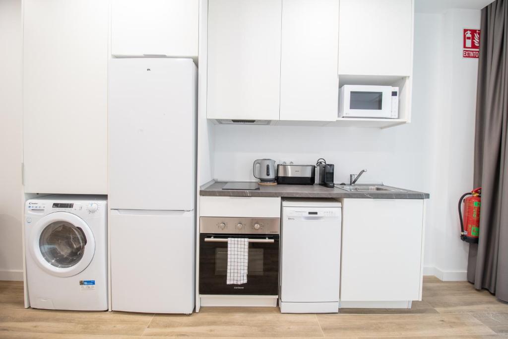 Kuchyňa alebo kuchynka v ubytovaní Cid 90 Flat by Concept