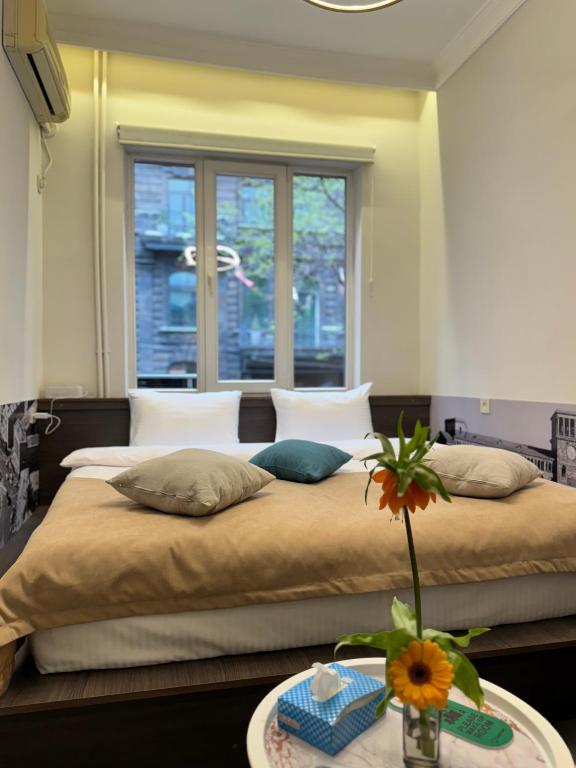 Postel nebo postele na pokoji v ubytování Centroom boutique hotel