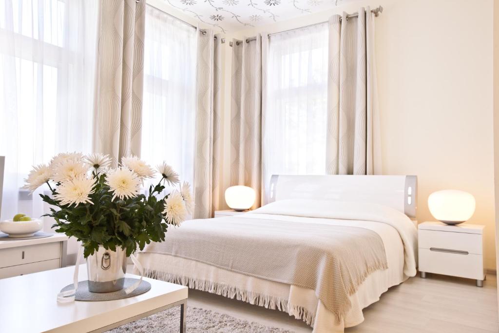 Postel nebo postele na pokoji v ubytování Hotel Dom Aktera