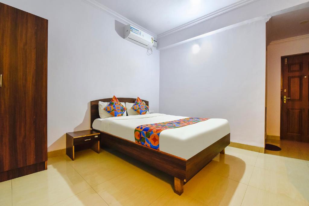 a bedroom with a bed in a room at FabHotel Springs in Sangolda