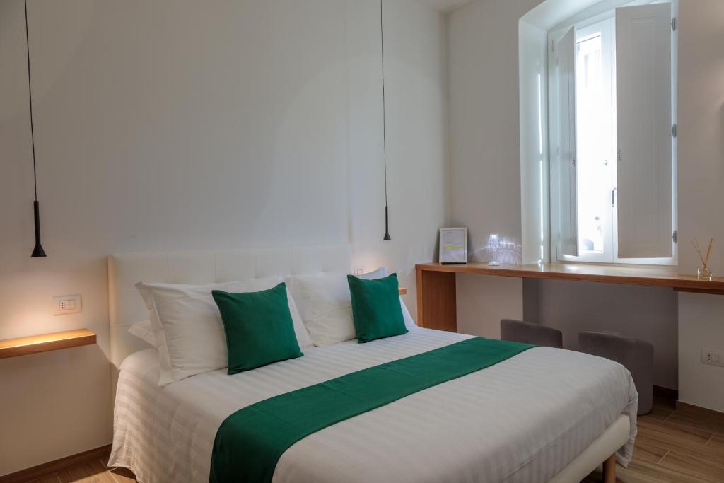 Postel nebo postele na pokoji v ubytování Blanco B&B - Group