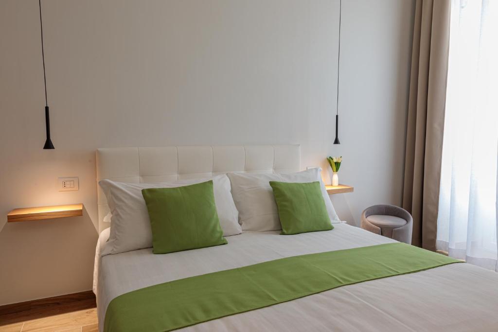 Postel nebo postele na pokoji v ubytování Blanco B&B - Group