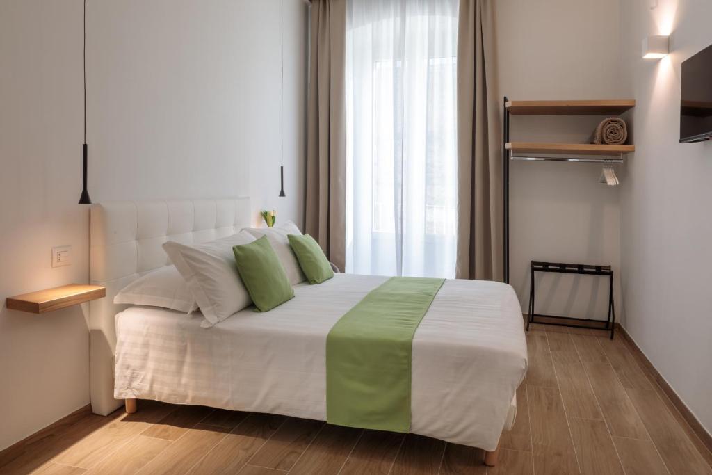Postel nebo postele na pokoji v ubytování Blanco B&B - Group
