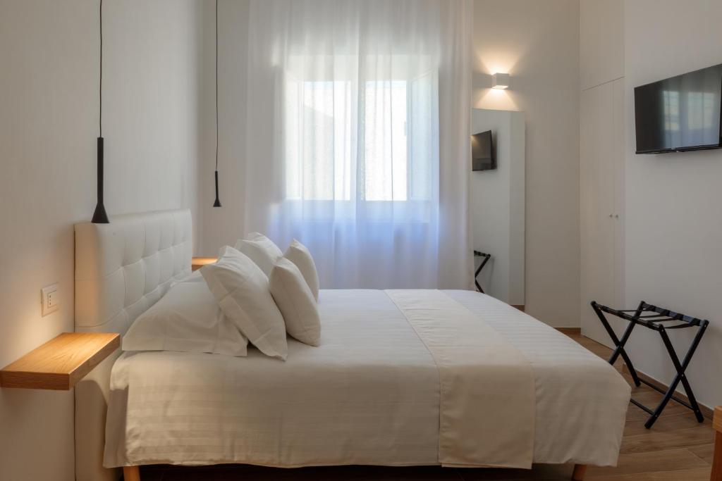 Postel nebo postele na pokoji v ubytování Blanco B&B - Group