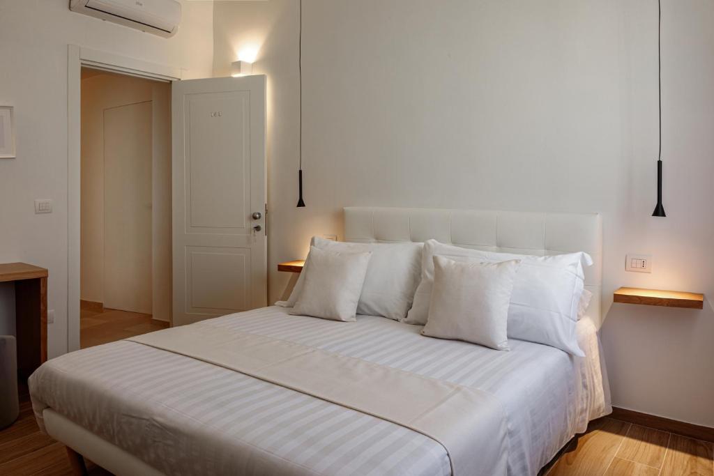 Postel nebo postele na pokoji v ubytování Blanco B&B - Group