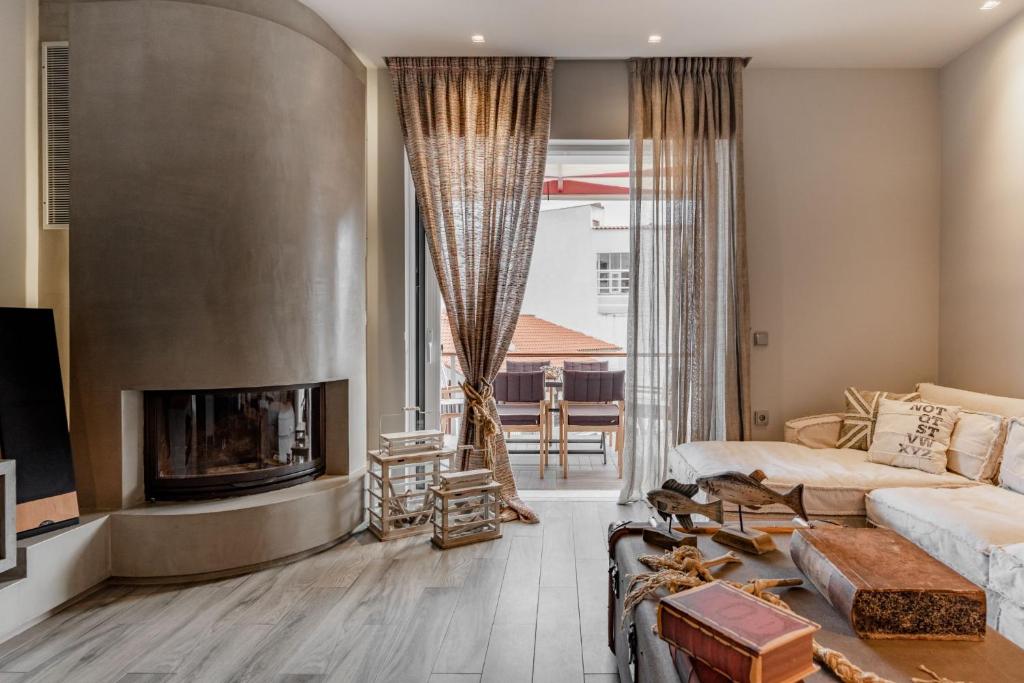 Postel nebo postele na pokoji v ubytování Tyros Boutique Houses Villas