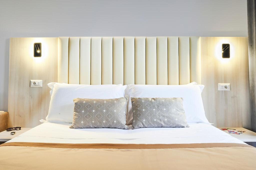 Postel nebo postele na pokoji v ubytování Hotel Brooklyn - ex Hotel Lombardi