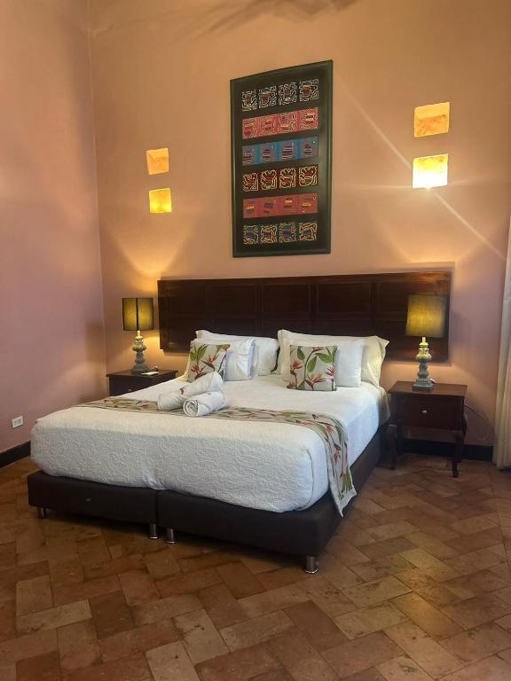 Postel nebo postele na pokoji v ubytování Hotel Boutique Casa Córdoba Estrella