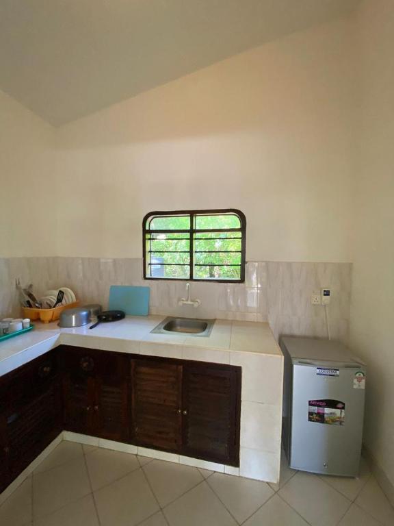 Kuchyň nebo kuchyňský kout v ubytování 2Livu Villas Watamu