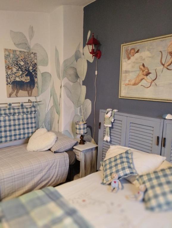 Postel nebo postele na pokoji v ubytování B&B LE GRETTE
