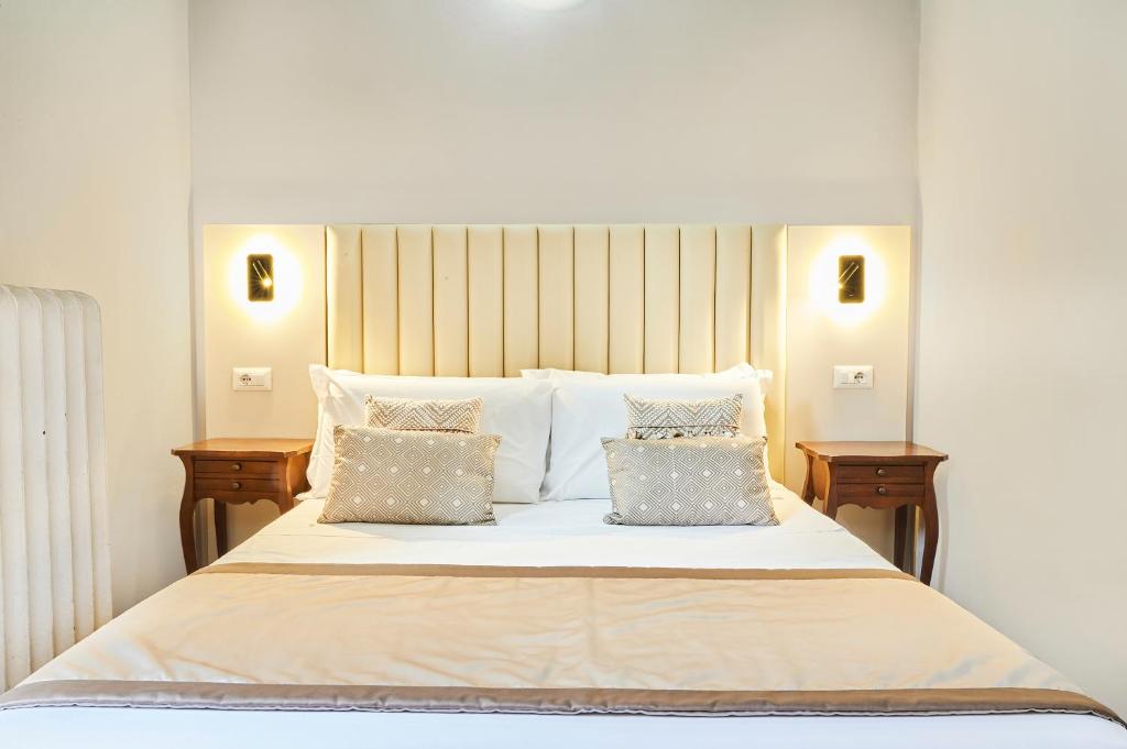 Postel nebo postele na pokoji v ubytování Hotel Brooklyn - ex Hotel Lombardi