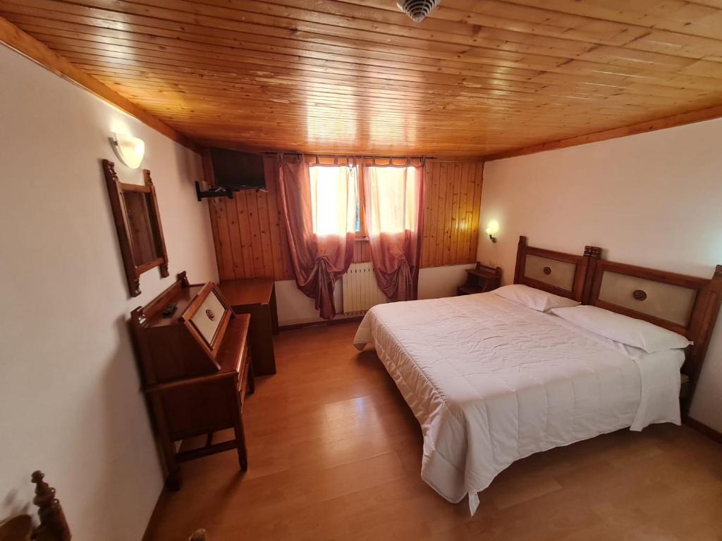 Postel nebo postele na pokoji v ubytování Hostel Il Pirata